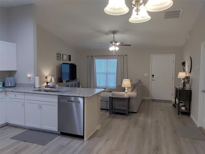 Furnished interior view inside a new home in , Dunnellon (Image 4).