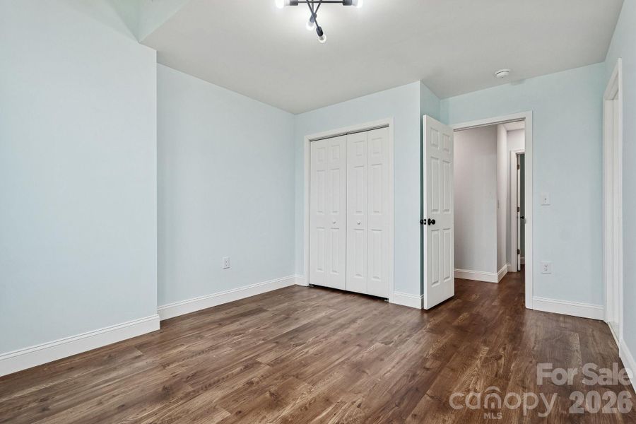 Large secondary bedroom facing the front of home with Jack and Jill full bathroom access