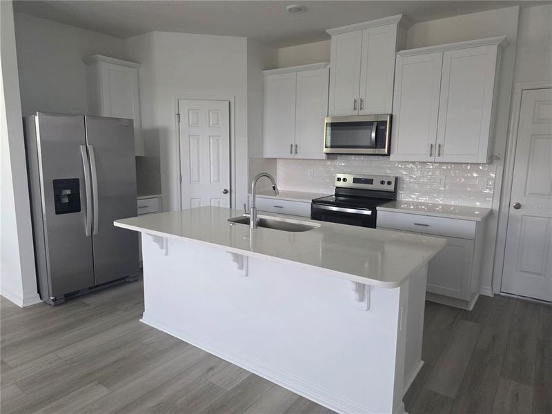 Furnished interior view inside a new home in The Meadow at Crossprairie Bungalows, St. Cloud (Image 14).