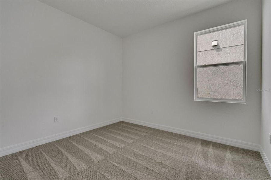 Spacious, unfurnished interior of a new home in Turnleaf, Punta Gorda (Image 27).