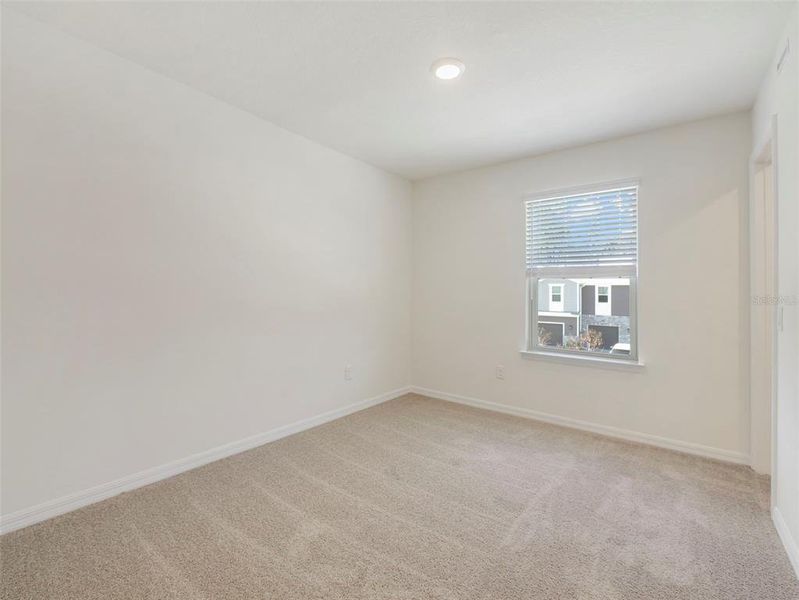 Spacious, unfurnished interior of a new home in Towns at Riverwalk, Sanford (Image 18).