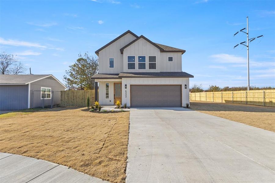 Front exterior of a new home in , Dallas, TX, highlighting curb appeal (Image 25).