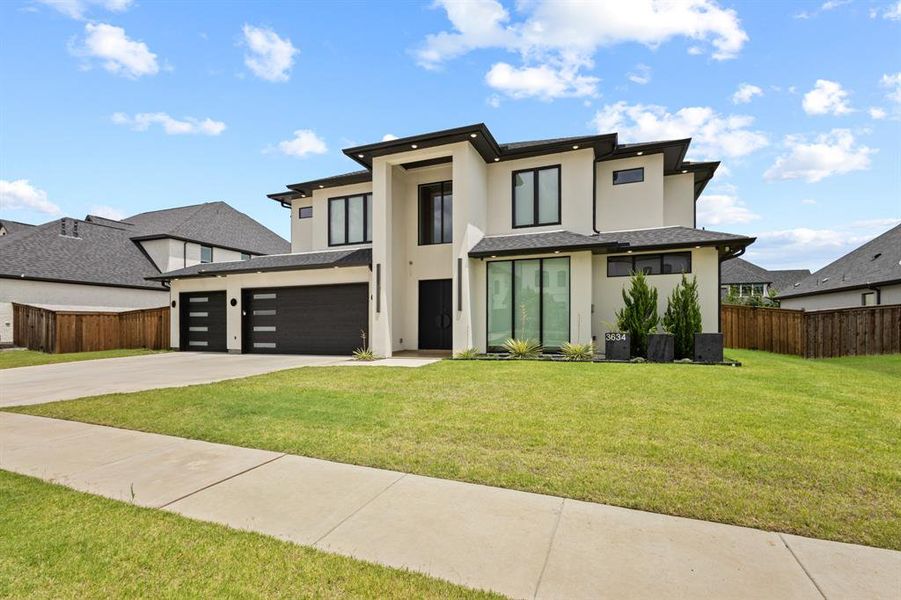 Front exterior of a new home in , Frisco, TX, highlighting curb appeal (Image 2). Front exterior of a new home in , Frisco, TX, highlighting curb appeal (Image 2).