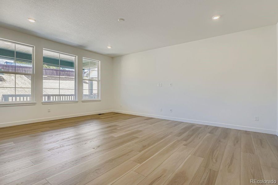 Spacious, unfurnished interior of a new home in Newlin Crossing: The Monarch Collection, Parker (Image 7). Spacious, unfurnished interior of a new home in Newlin Crossing: The Monarch Collection, Parker (Image 7).