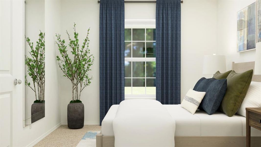 Bedroom featuring baseboards and carpet flooring