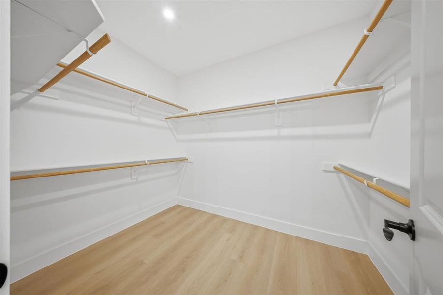 Primary walk in closet.