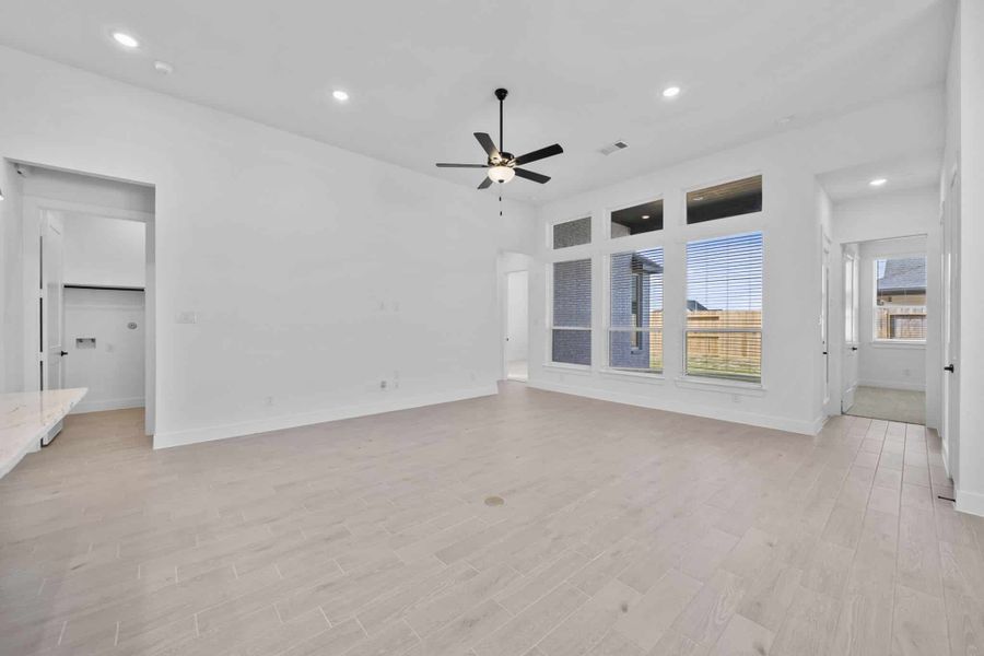 Representative unfurnished interior of a home built from the Summerton by Chesmar Homes in Grange, Katy (Image 13).