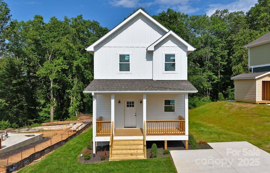 Front exterior of a new home in , Asheville, NC, highlighting curb appeal (Image 14).