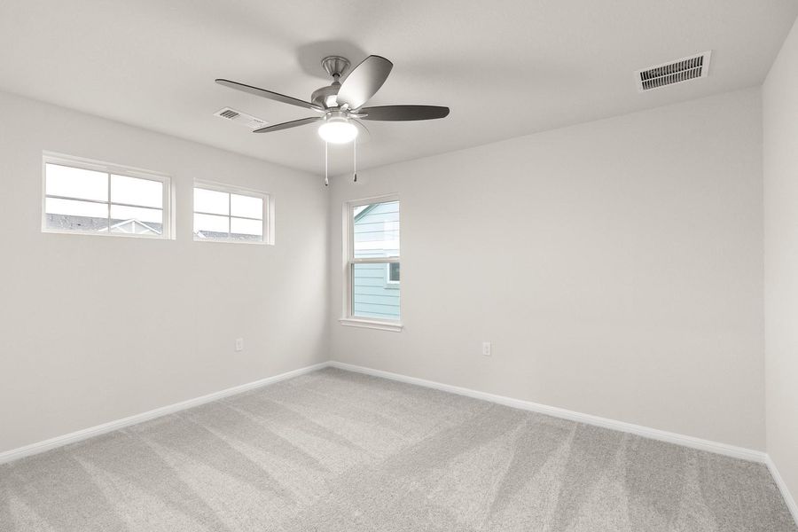 This room features light-colored walls and soft grey carpeting