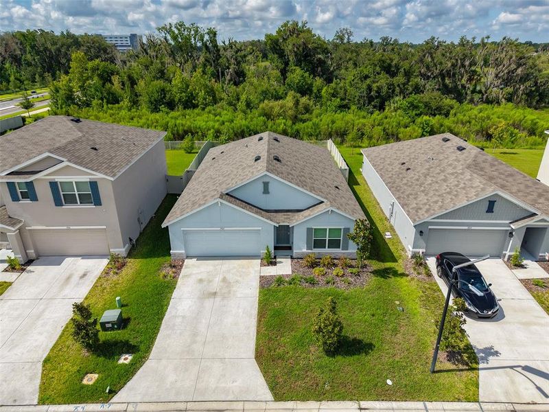 Front exterior of a new home in North Park Isle, Plant City, FL, highlighting curb appeal (Image 17). Front exterior of a new home in North Park Isle, Plant City, FL, highlighting curb appeal (Image 17).