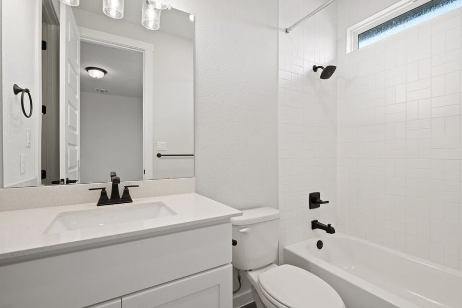 Furnished interior view inside a new home in Terrace Collection at Lariat, Liberty Hill (Image 17). Furnished interior view inside a new home in Terrace Collection at Lariat, Liberty Hill (Image 17).