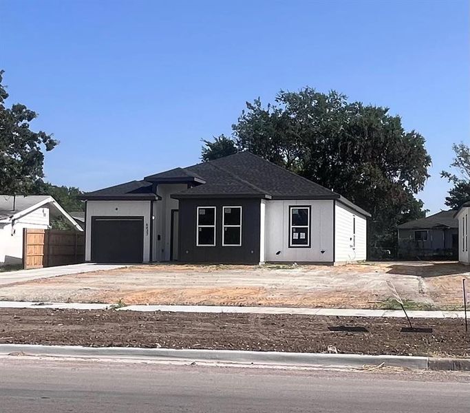 View of front of home with a garage