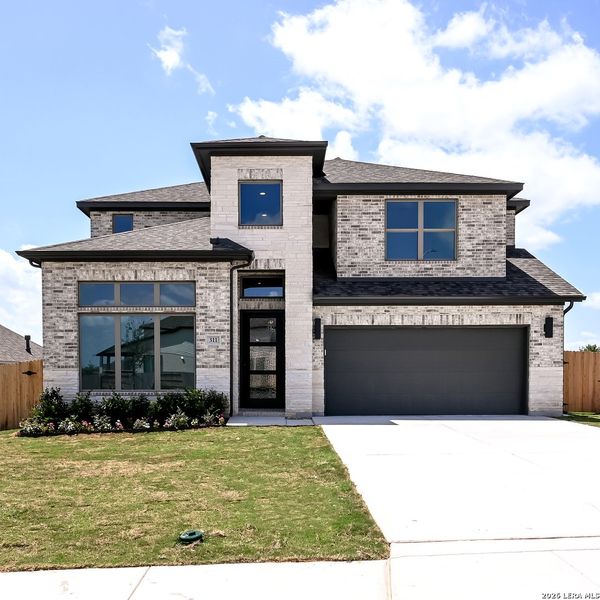 Front exterior of a new home in Cibolo Valley Heights, Cibolo, TX, highlighting curb appeal (Image 18).