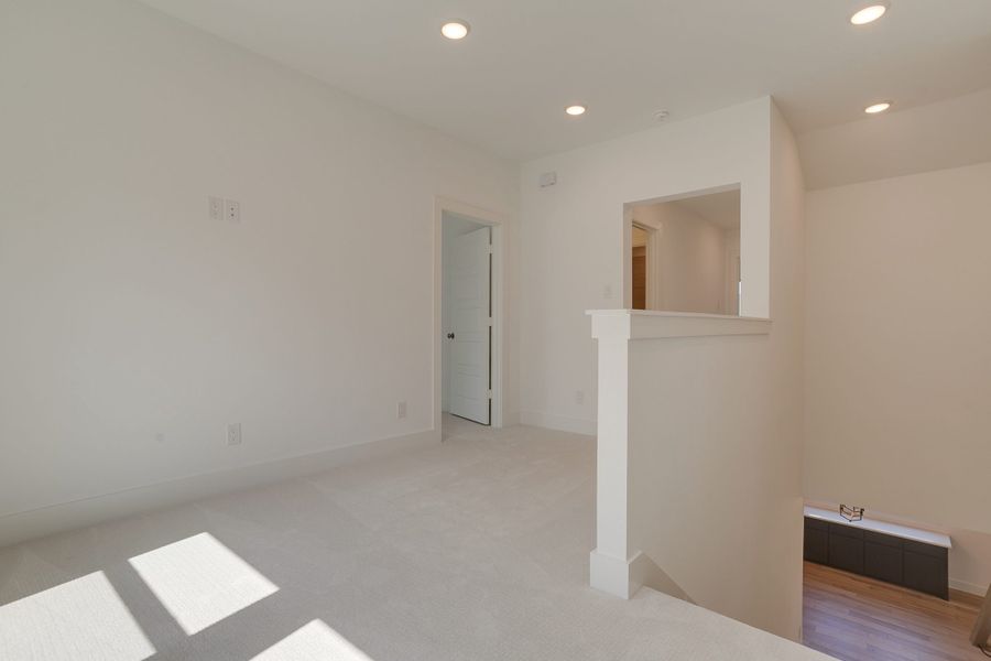 Representative unfurnished interior of a home built from the Longview by Graham Hart Home Builder in Bear Ridge, Burleson (Image 18).