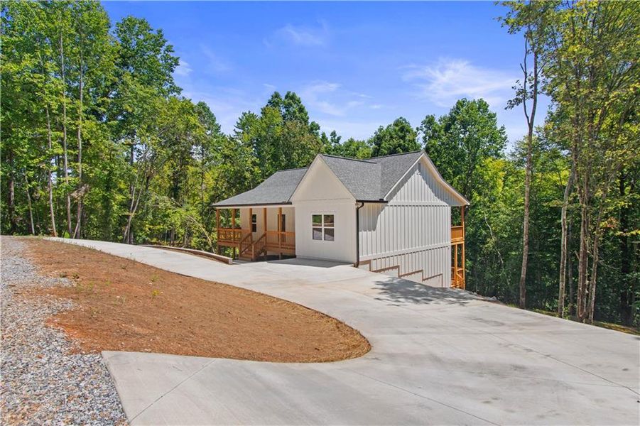 Front exterior of a new home in , Dawsonville, GA, highlighting curb appeal (Image 2). Front exterior of a new home in , Dawsonville, GA, highlighting curb appeal (Image 2).