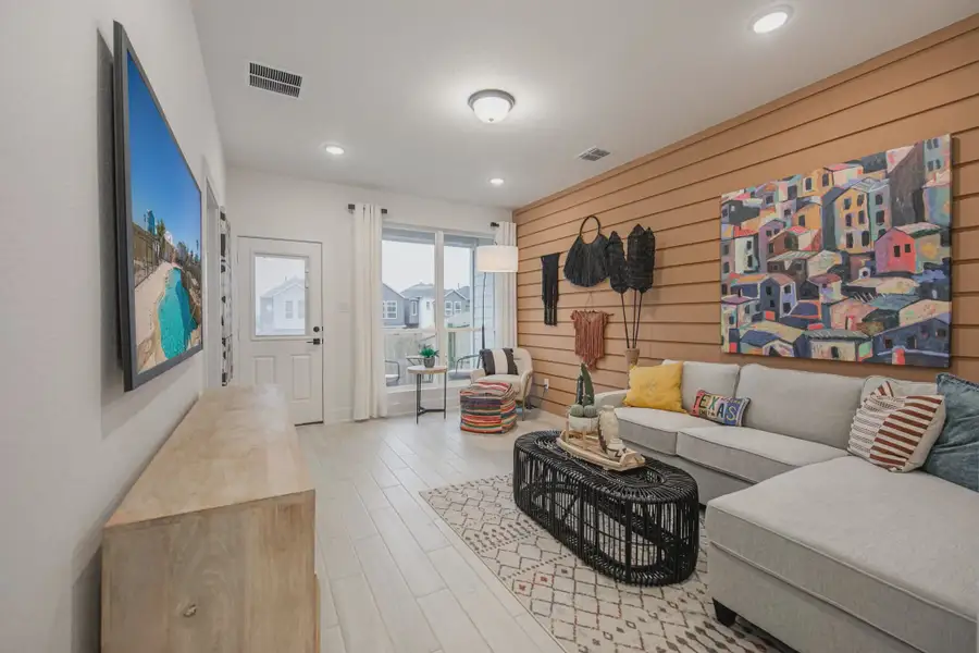 Representative furnished interior of a home built from the Athena by Chesmar Homes in Santa Rita Ranch, Liberty Hill (Image 9).