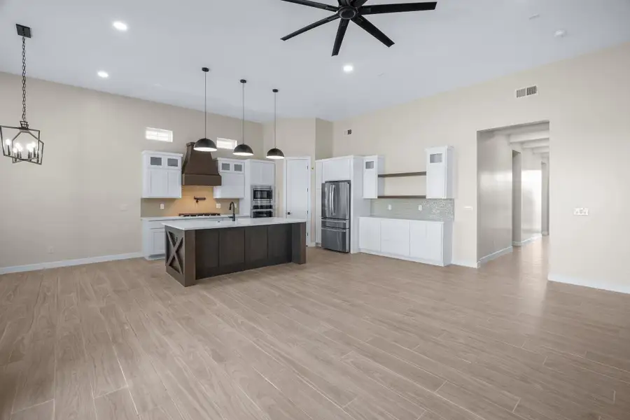 Representative furnished interior of a home built from the Pebble Beach EXT50 by LEH. Homes in Verdancia, El Paso (Image 3).