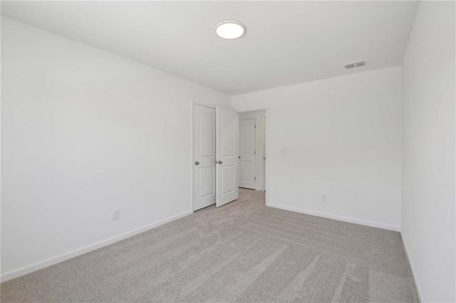 Spacious, unfurnished interior of a new home in The Pointe at Heron Bay, Locust Grove (Image 19).
