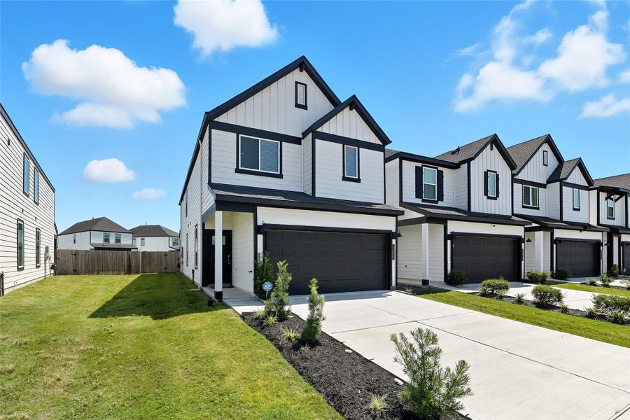 The home has an extended driveway, two-car garage, and a fantastic amount of space between you and neighbor, adding some nice breathing room.