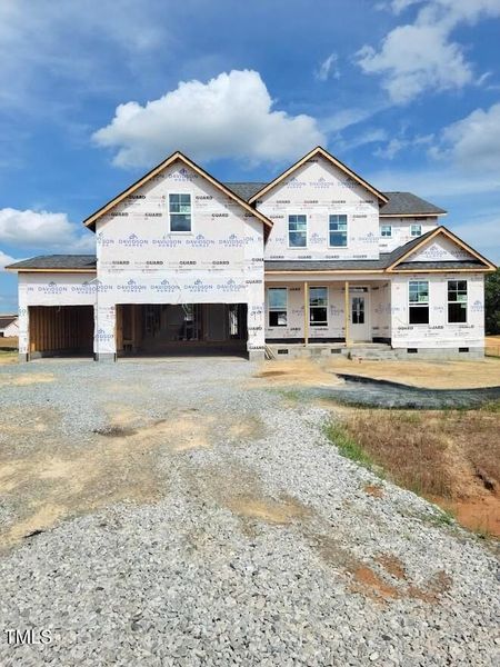 Front exterior of a new home in Tobacco Road, Angier, NC, highlighting curb appeal (Image 43).