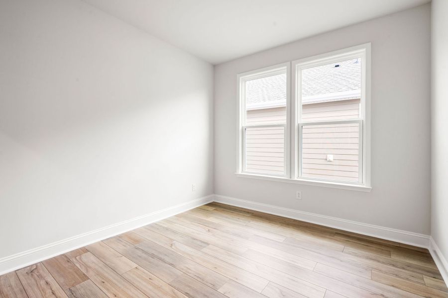 Spacious, unfurnished interior of a new home in Sun City Hilton Head, Bluffton (Image 18).