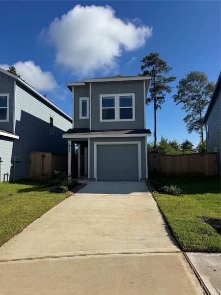 Front exterior of a new home in Sila, Huffman, TX, highlighting curb appeal (Image 1). Front exterior of a new home in Sila, Huffman, TX, highlighting curb appeal (Image 1).