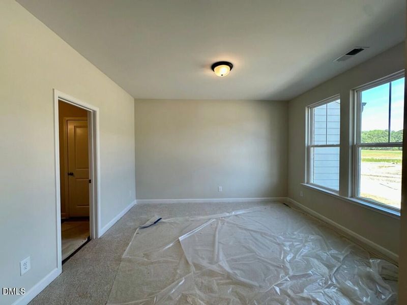 In-progress construction of a new home in Forestville Yard Townhomes, Knightdale, NC (Image 19).