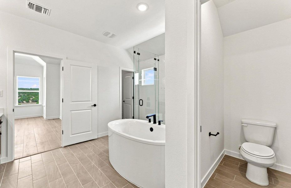 Furnished interior view inside a new home in West Cypress Hills, Spicewood (Image 8).