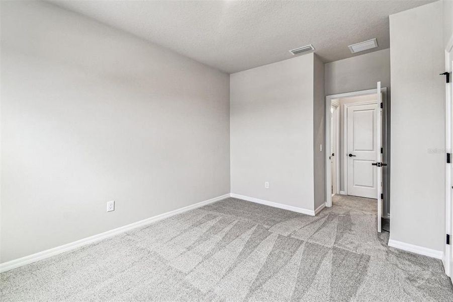 Spacious, unfurnished interior of a new home in Oakfield at Mount Dora Village Series, Mount Dora (Image 14).