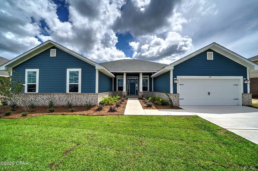 Front exterior of a new home in Cedar Creek at Deerpoint Lake, Panama City, FL, highlighting curb appeal (Image 1). Front exterior of a new home in Cedar Creek at Deerpoint Lake, Panama City, FL, highlighting curb appeal (Image 1).
