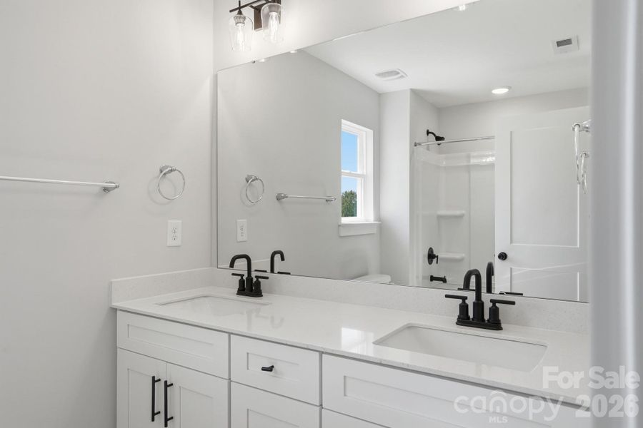 Furnished interior view inside a new home in Blythe Mill Townhomes, Waxhaw (Image 7).