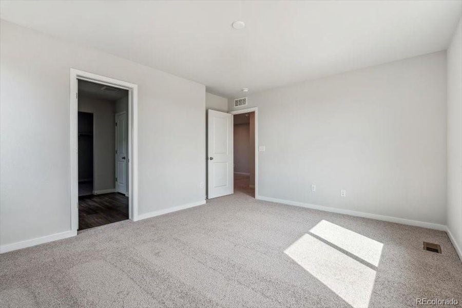 Spacious, unfurnished interior of a new home in Red Barn Meadows, Mead (Image 23).