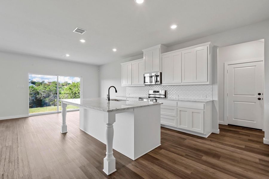 Representative furnished interior of a home built from the Garrison II by Cheldan Homes in Arbor Oaks, Boyd (Image 11).