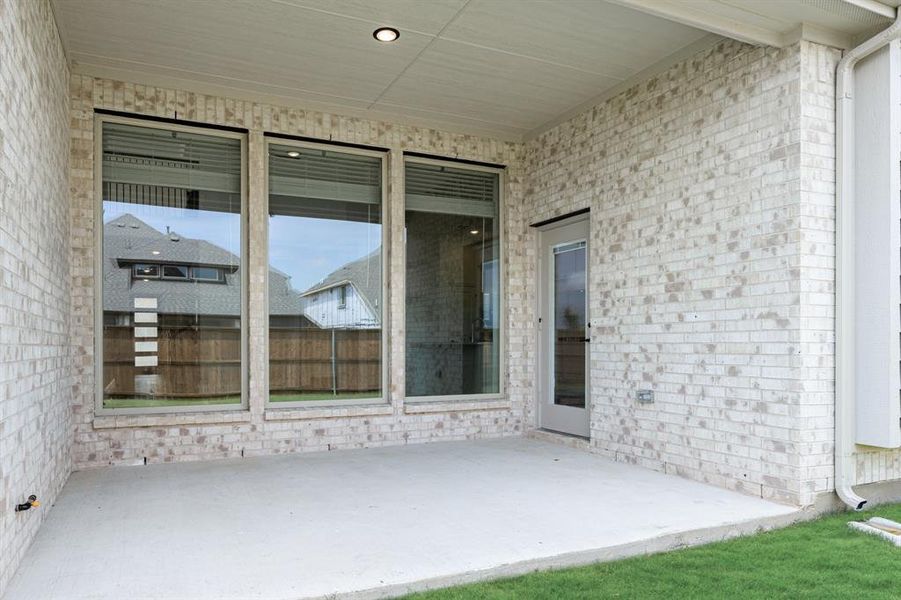 Exterior details and patio area of a home in Creekview Meadows, Pilot Point (Image 3). Exterior details and patio area of a home in Creekview Meadows, Pilot Point (Image 3).