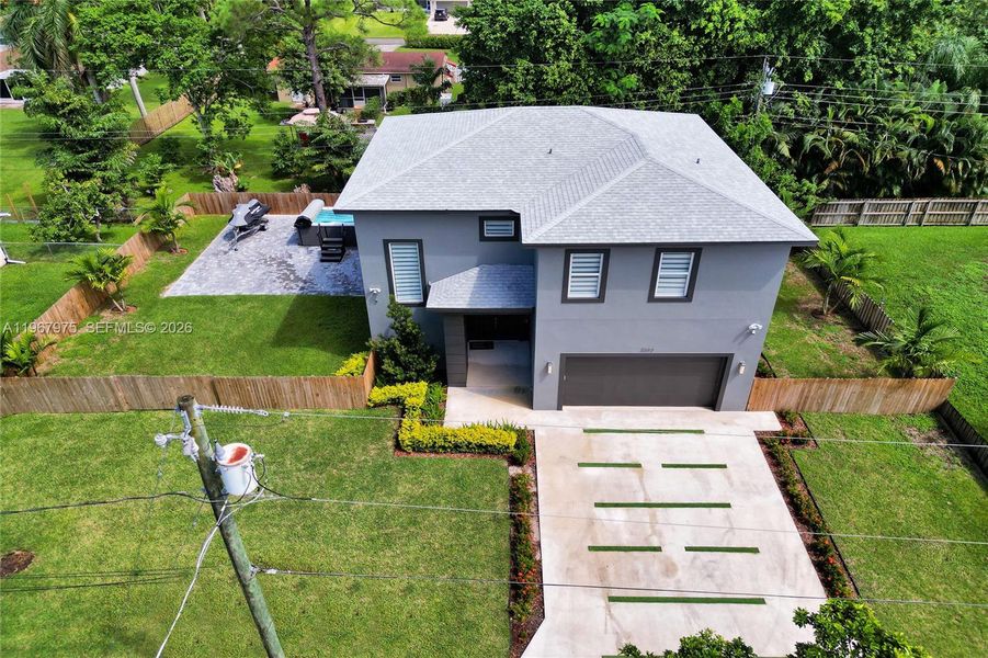 Front exterior of a new home in , Lake Worth, FL, highlighting curb appeal (Image 26). Front exterior of a new home in , Lake Worth, FL, highlighting curb appeal (Image 26).