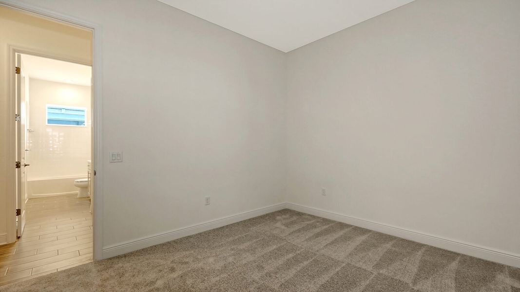 Spacious, unfurnished interior of a new home in Wildleaf at North River Ranch, Parrish (Image 33).