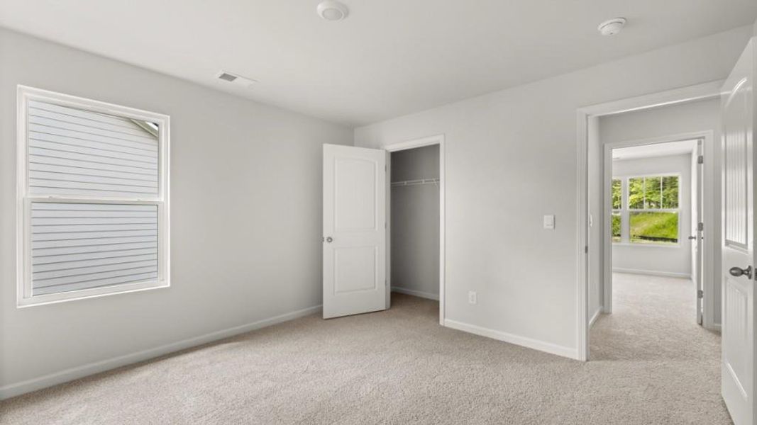 Spacious, unfurnished interior of a new home in Northwoods at Mirror Lake, Villa Rica (Image 27).