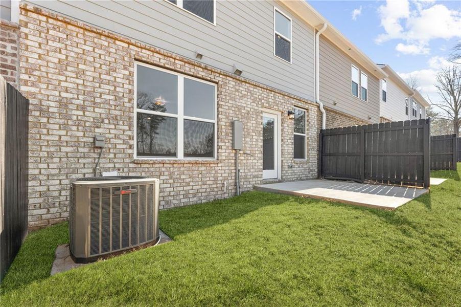 Exterior details and patio area of a home in Porter Reserve, Decatur (Image 3).