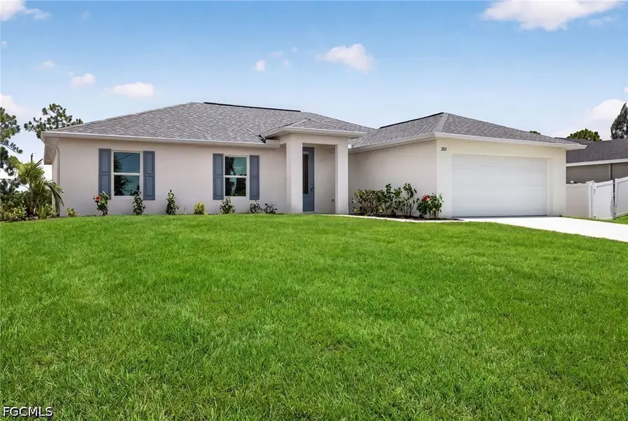 Front exterior of a new home in Cape Coral, Cape Coral, FL, highlighting curb appeal (Image 2). Front exterior of a new home in Cape Coral, Cape Coral, FL, highlighting curb appeal (Image 2).