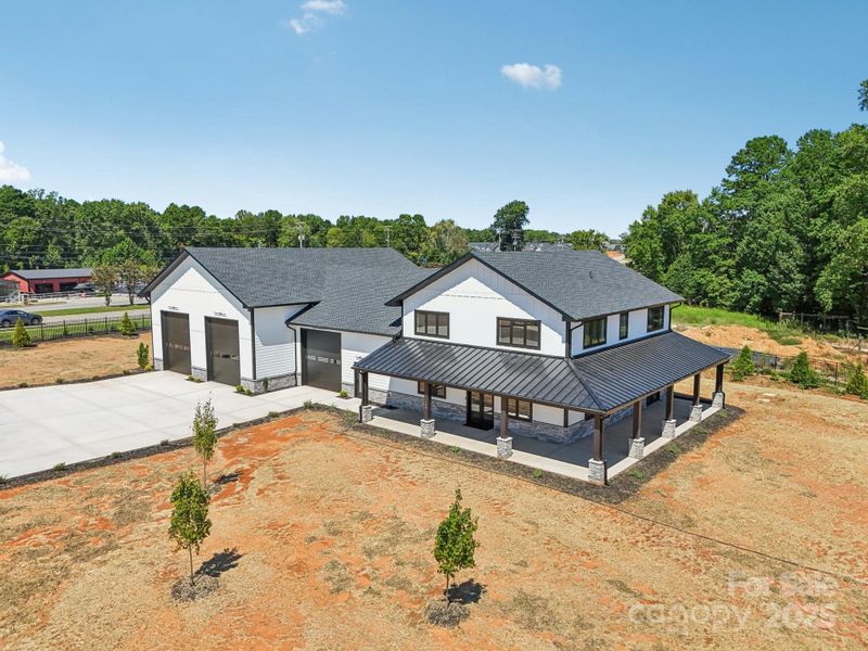 Front exterior of a new home in , Mooresville, NC, highlighting curb appeal (Image 27). Front exterior of a new home in , Mooresville, NC, highlighting curb appeal (Image 27).