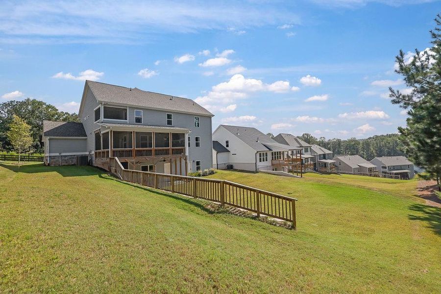 Exterior details and patio area of a home in , Flowery Branch (Image 26).