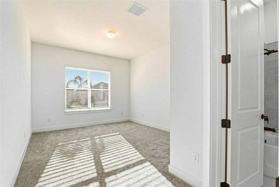 Spacious, unfurnished interior of a new home in Vida's Way, Wesley Chapel (Image 47).