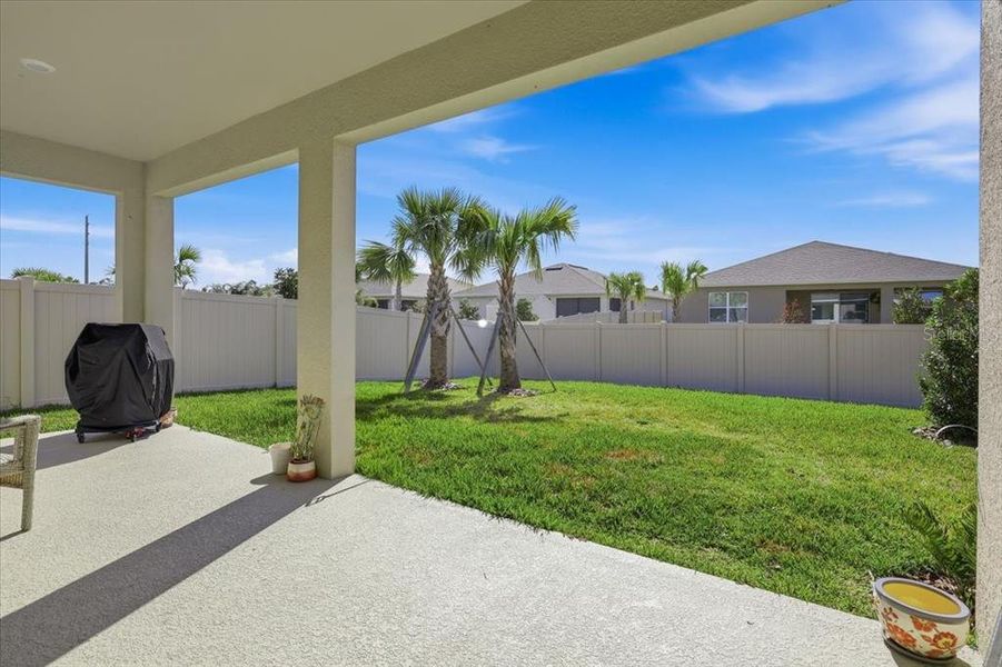 Exterior details and patio area of a home in Archers Mill, Ormond Beach (Image 27).