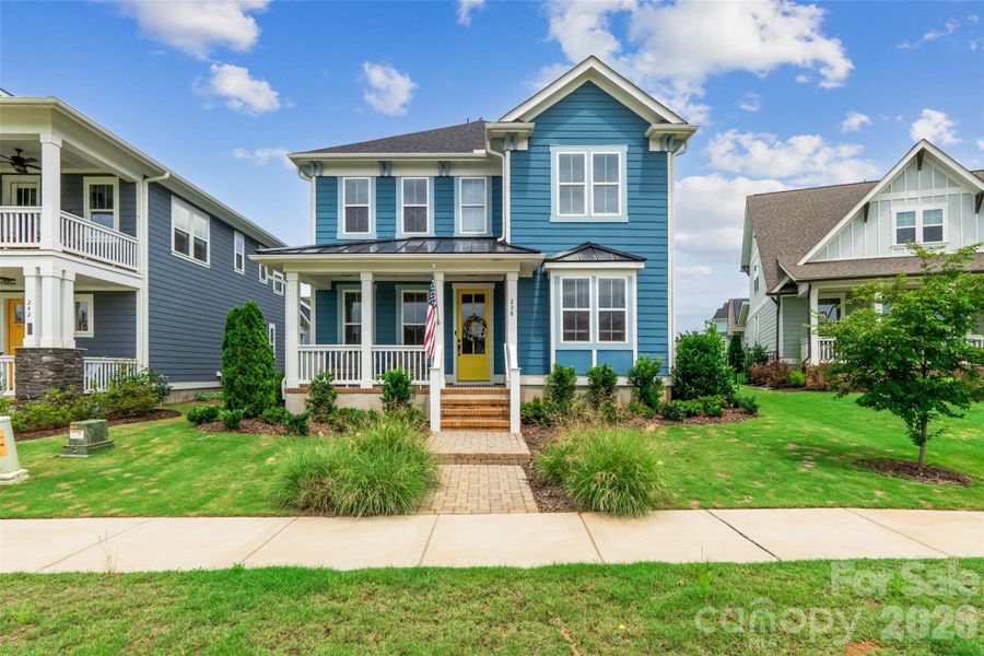 Front exterior of a new home in Riverwalk, Rock Hill, SC, highlighting curb appeal (Image 21).