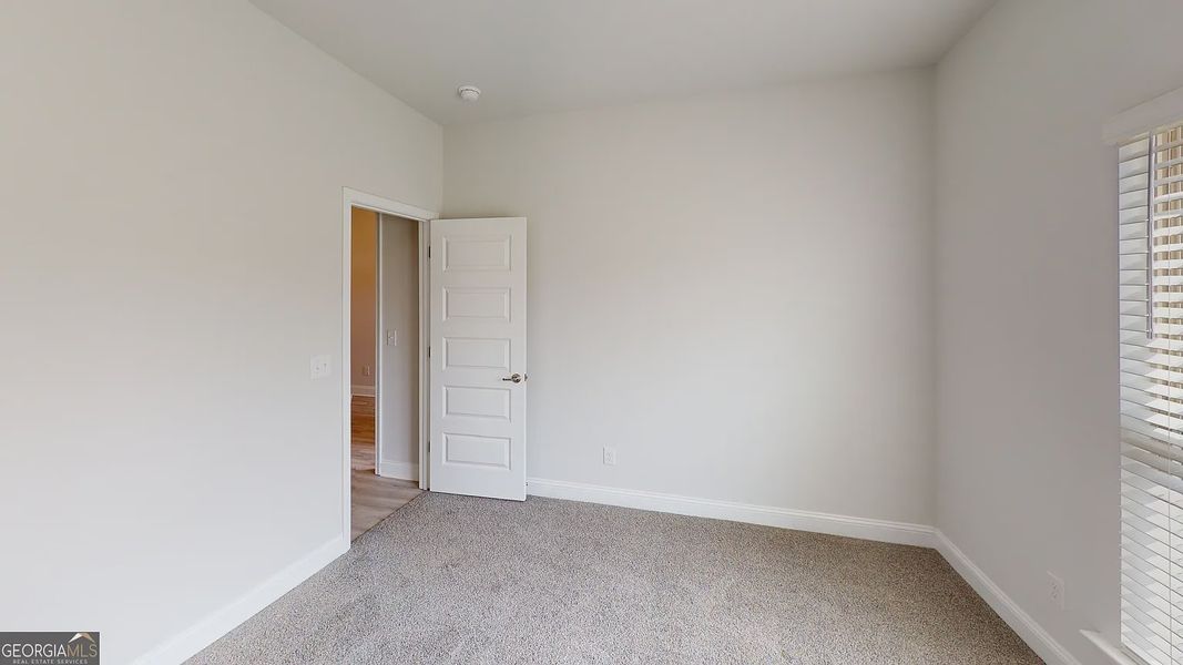 Spacious, unfurnished interior of a new home in Holliday Pass, Griffin (Image 28).