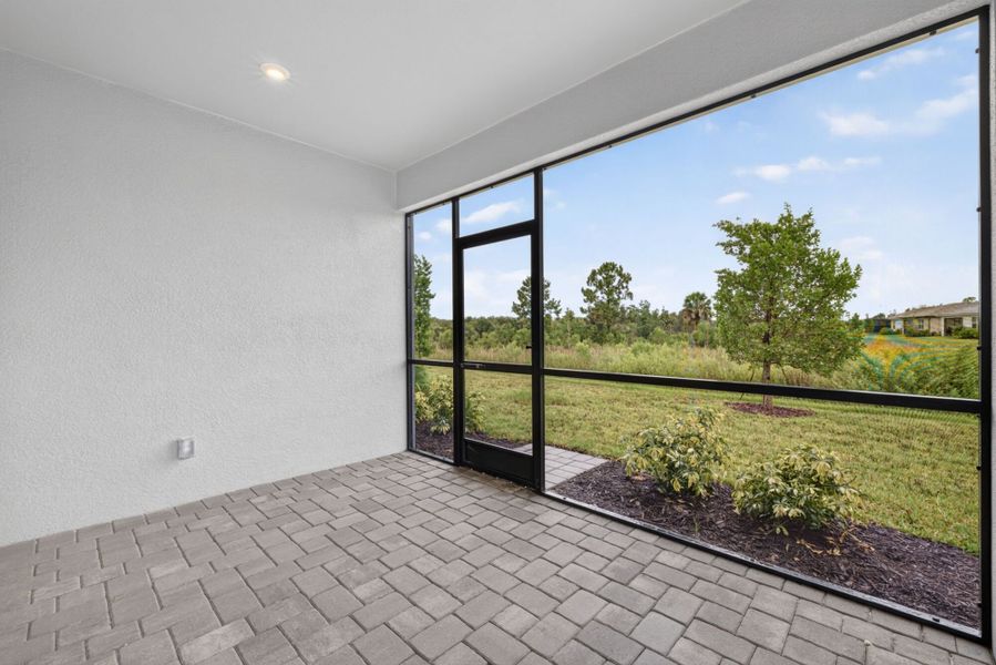 Exterior details and patio area of a home in Wellen Park, Venice (Image 2).