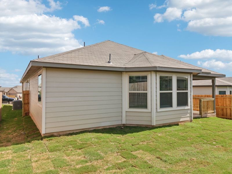 Exterior details and patio area of a home in Lark Canyon, New Braunfels (Image 23).