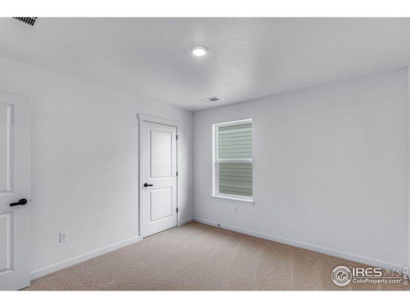 Spacious, unfurnished interior of a new home in Hansen Farm, Fort Collins (Image 27).