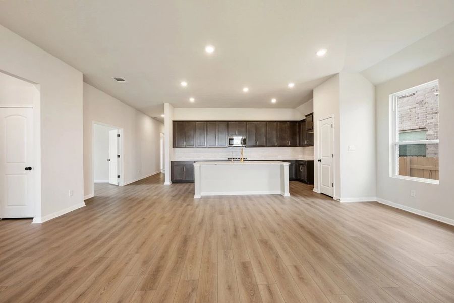 Spacious, unfurnished interior of a new home in The Colony 50s, Bastrop (Image 39).