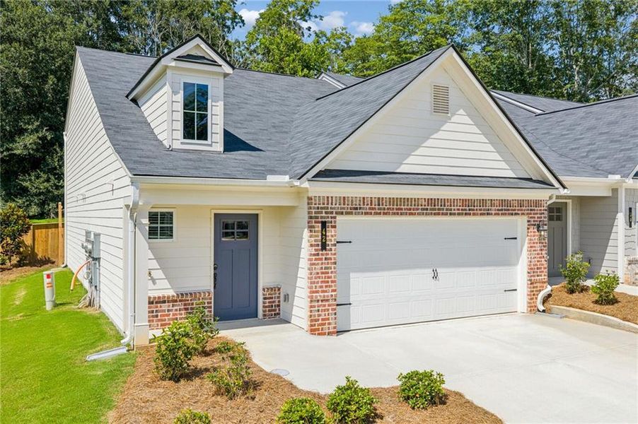 Front exterior of a new home in Silver Leaf, Dawsonville, GA, highlighting curb appeal (Image 2). Front exterior of a new home in Silver Leaf, Dawsonville, GA, highlighting curb appeal (Image 2).